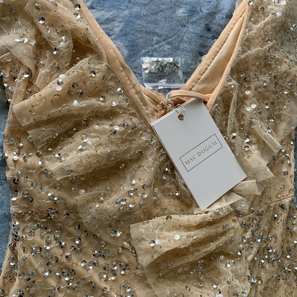 Mac Duggal Sequin Ruffle Asymmetric
Neck Tulle Gown/with Flutter Cap Sleeves - Picture 5 of 14